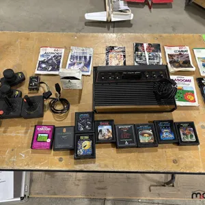 Atari CDX 2600 Gaming System w/ Games and Remotes
 UNRESERVED