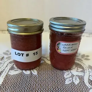Two jars of crab apple sauce