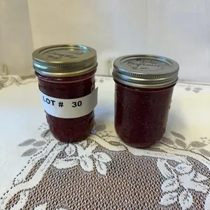 Two jars regular raspberry jam