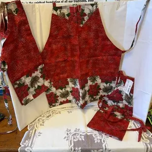 Mother and two daughters Christmas aprons