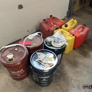 (4) Pails of Oil (Some Have Been Opened) & (5) Gas Cans
 UNRESERVED