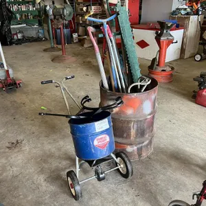 Lawn Spreader and Assorted Gardening Tools
 UNRESERVED