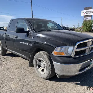 2012 Dodge Ram 1500 SXT Quad Cab Truck
 RESERVE LIFTED