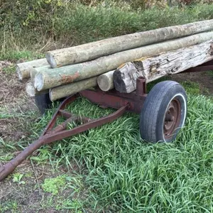 4-wheel wagon with 7 treated posts up to 12’ long