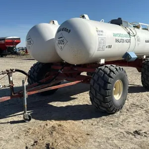 Twin 1000gal NH3 tanks on HD Johnson Welding 4-wheel wagon (Unit #100)
