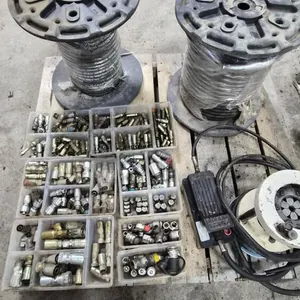 Hydraulic hose crimper,  4 full sets of dies,  2 rolls of new hose, misc ends