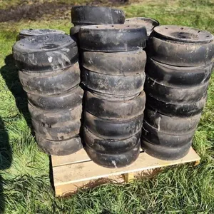 2 pallets of 4 1/2” guage wheels for disc drill 34 complete,  46 dissasembled with bearings missing