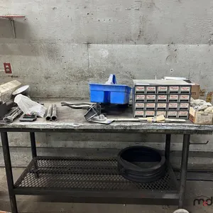 Metal Table on Wheels with Contents
 UNRESERVED