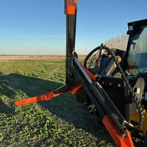 The Grabber skid steer mount tire handling system