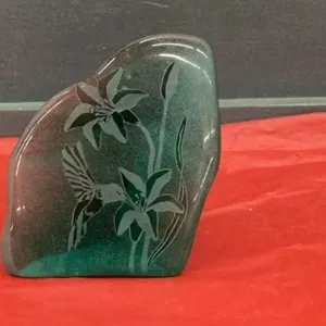 GREEN GLASS DECOR W/ HUMMINGBIRD ENGRAVED ON IT