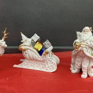 WHITE PORCELAIN SANTA W/ SLEIGH & REINDEER