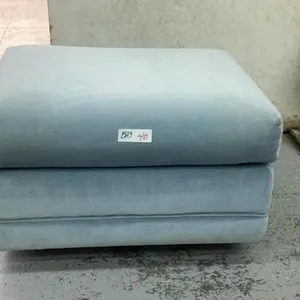 BLUE VELOUR ROLLING OTTOMAN