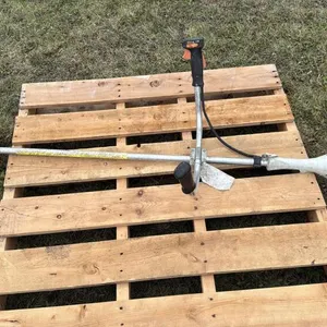 Stihl FS55 gas powered trimmer w/ blade attachment