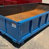 Okie Fabrication  roll-off container 