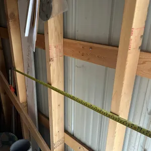 24x14 WOOD FRAMED GARAgE ON A CONCRETE BASE 10'x8' OVERHEAD DOOR - - (BUYER MUST HAVE BUILDING REMOVED BY JULY 30, 2026)  BY BIDDING ON THIS LOT YOU A