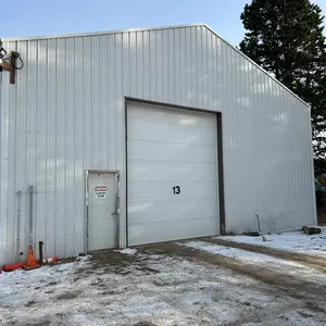 WOOD FRAMED POLE BUILDING 40x60 W/ 2x6 BASE PLATE - L SHAPED MEZZANINE 12'x60' & 16'x16' - (BUYER MUST HAVE BUILDING REMOVED BY JULY 30, 2026)  BY BID