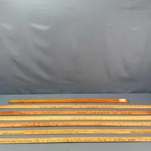 (6) YARD STICKS AND (1) DIP STICK