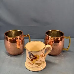 (2) COPPER CLAD MUGS AND A VINTAGE CHAMBER CUP
