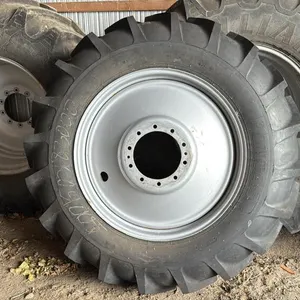 (2) Mitas 18.4-38 TD-19 tires on 10 bolt rim (like new 95%)