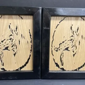 Handcrafted pair of wooden scrolled wall hangings