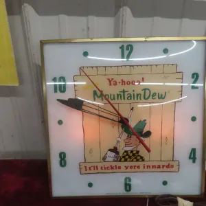 Lighted Mountain Dew Clock W/ Hillbilly Character by Pam Clock Corp, C. 1960s, 15" x 15"