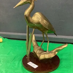 BRASS CRANE ON WOOD BASE
