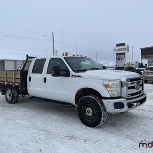 2014 Ford F350 Super Duty Crew Cab Flatbed Truck (Located in Headingley, MB)
 UNRESERVED