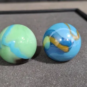 2 opaque swirl marbles 1 5/8" vintage