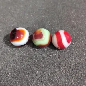 3 oxblood corkscrew marbles 11/16" and 3/4"