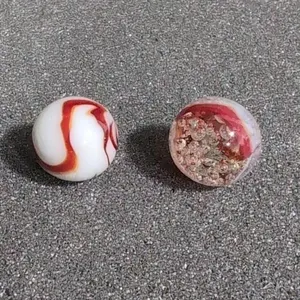 2 Oxblood marbles 5/8" vintage
