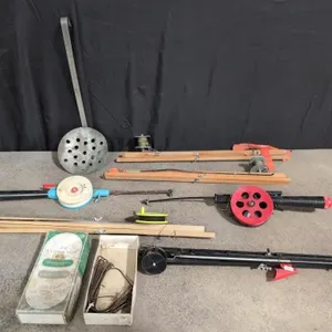 Ice fishing tip-ups, rods, dipper and 15 bait