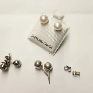 3 Sets of Silver Stud Earrings, including