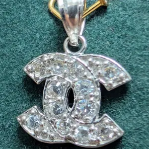10K White Gold Logo Pendant, 0.85gr.