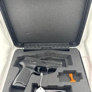SIG P320 9MM 
Two 15 round clips and case