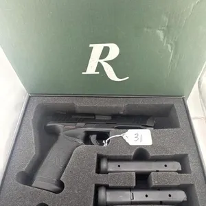 Remington RP9 9MM
One 10 round clip, two 18