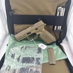 FN 510 10 MM
Two 15 round clips, bag, box, and