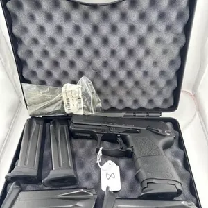 HK USP Compact .40 S&W with extra .357