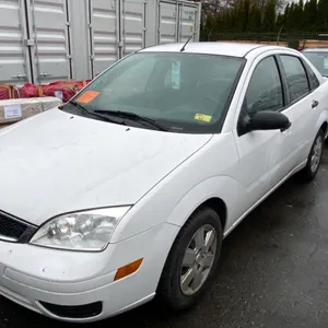 2007 FORD FOCUS SE, 4DRSD, WHITE, VIN 1FAFP34N97W232462,