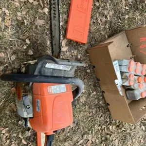 K87. Stihl MS290 chainsaw, oil and chains