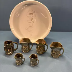 (6) ENGLISH MADE METAL PITCHERS