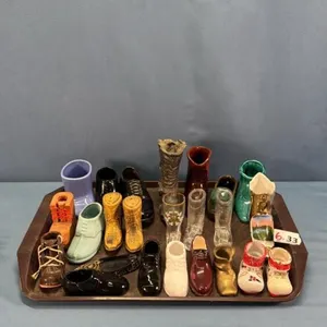APPROX. 24 POTTERY GLASS & METAL SLIPPERS & BOOTS