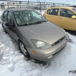 SALVAGE UNIT: 2003 Ford Focus Car (Gold)
 UNRESERVED