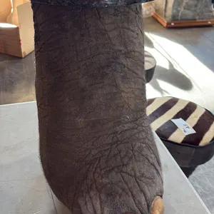 GRANITE/ELEPHANT LEG TABLE WITH PAPERWORK