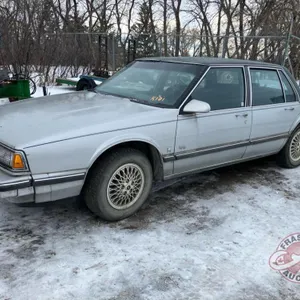 K101. 1989 Oldsmobile Delta 88 Brougham car, 193,450 Showing, VIN# 1G3HY51C6KW322871, OWNER: The Estate of George Moffat, SELLER: FRASER AUCTION______