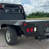 2014 Ford F350 Super Duty  Crew Cab flatbed pickup truck