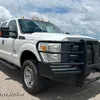 2014 Ford F350 Super Duty  Crew Cab flatbed pickup truck