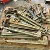 Approximately 30 pipe wrenches