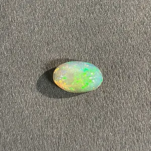 2 CT OVAL CABOCHON CUT NATURAL FIRE OPAL: 7MM X 11.4MM