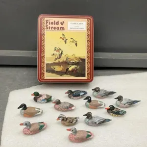 (12) MINI HAND CARVED WOOD DUCKS IN FIELD & STREAMS TIN BOX
