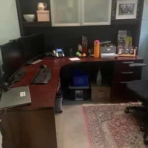MAHOGANY LAMINATE APPROX 6'X6' CORNER COMPUTER DESK WITH MINOR DOOR DAMAGE, COMPLETELY DISASSEMBLED